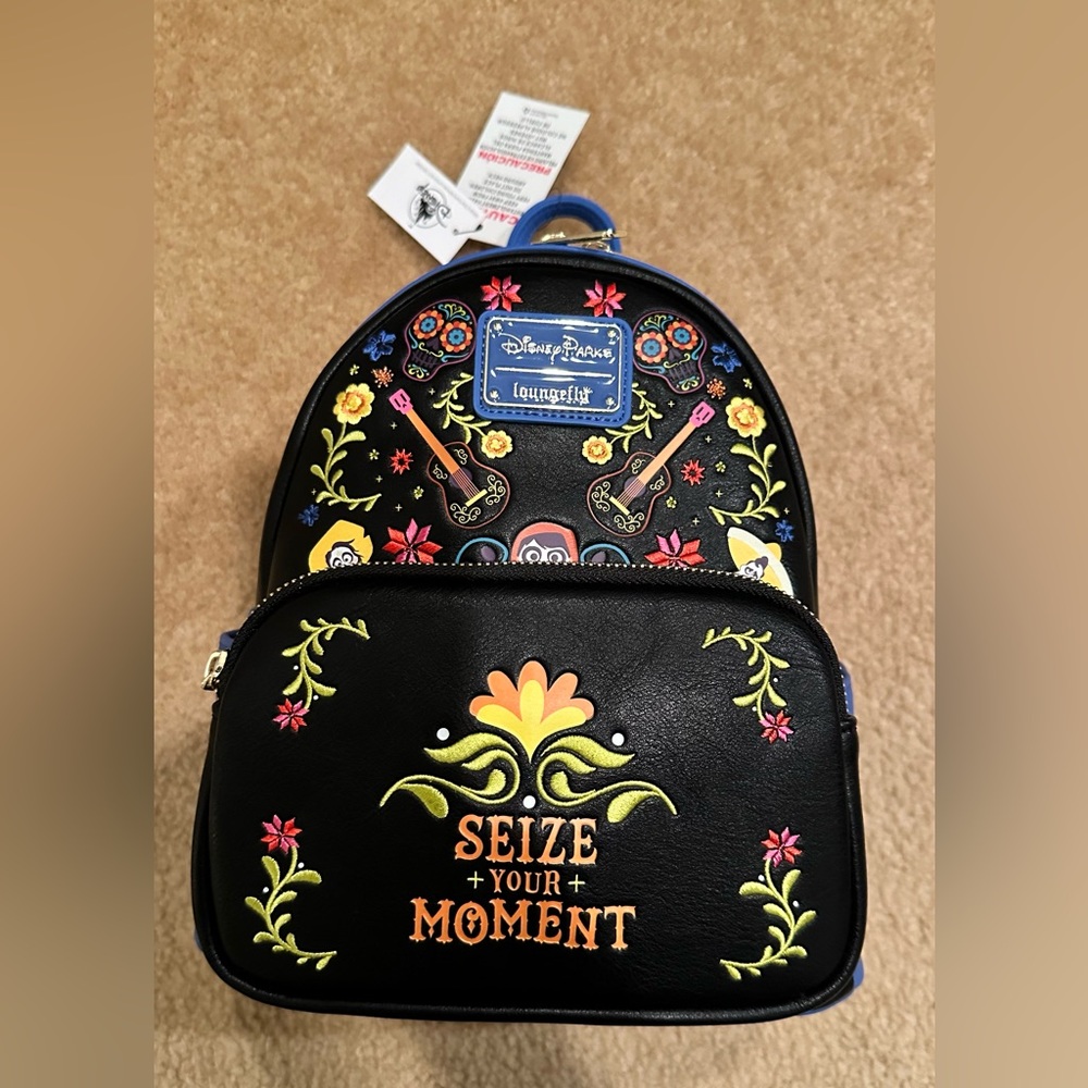 Coco themed Disney Parks Loungefly backpack